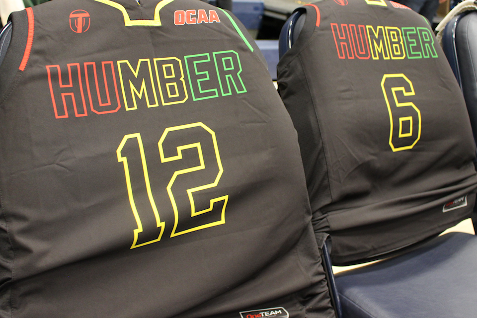 Close up shot of the Humber Hawks' new Black Heritage Jerseys, numbers 12 and 6.