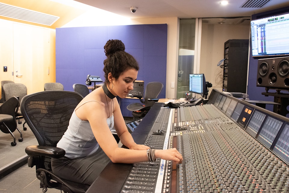 Woman at sound board