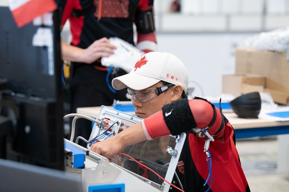 Dillon Kong shows off his skills at a mechatronics competition.