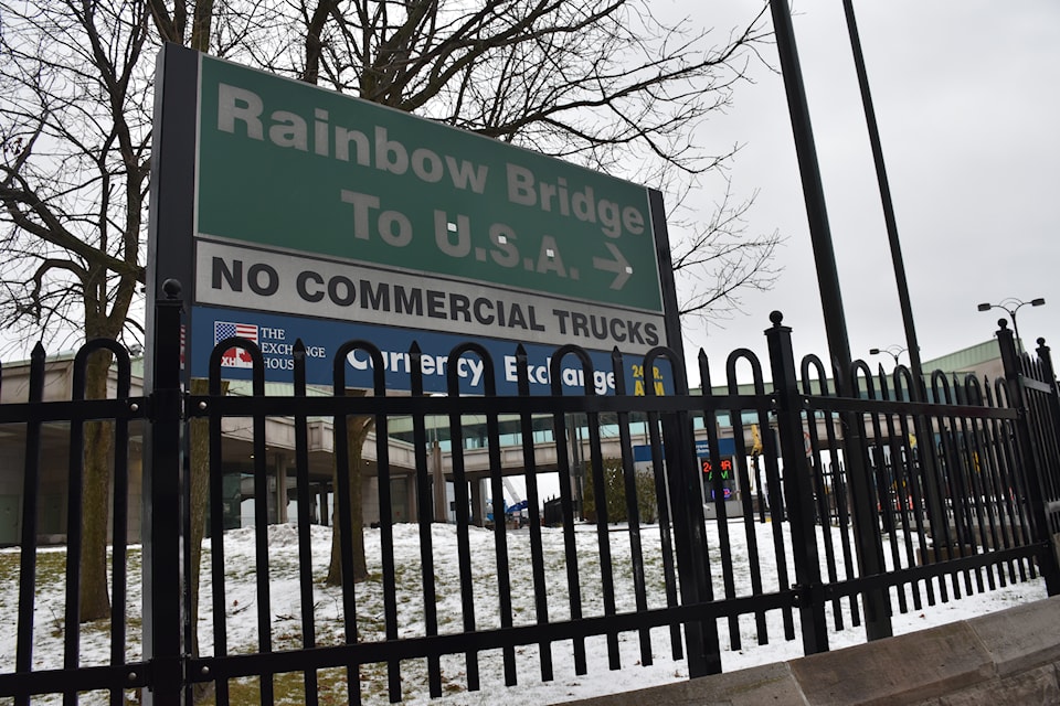 A road sign signalling the way to the Rainbow Bridge leading to the U.S. A trade war looms as the U.S. administration plans to impose a 25 per cent tariff across the board.