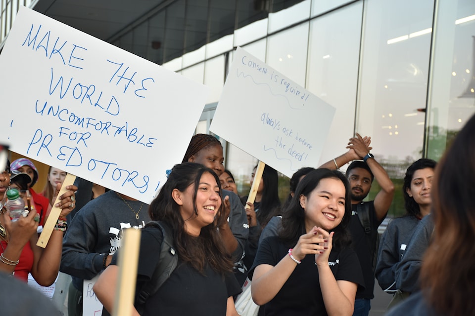 Protestors with signs.