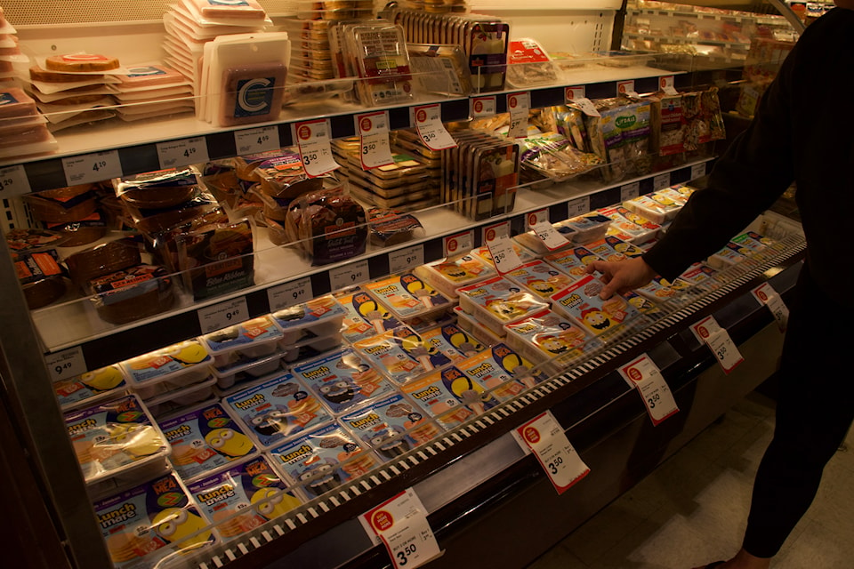 A person picking up a Lunchable at a grocery store. HumberETC/Aislinn Millette