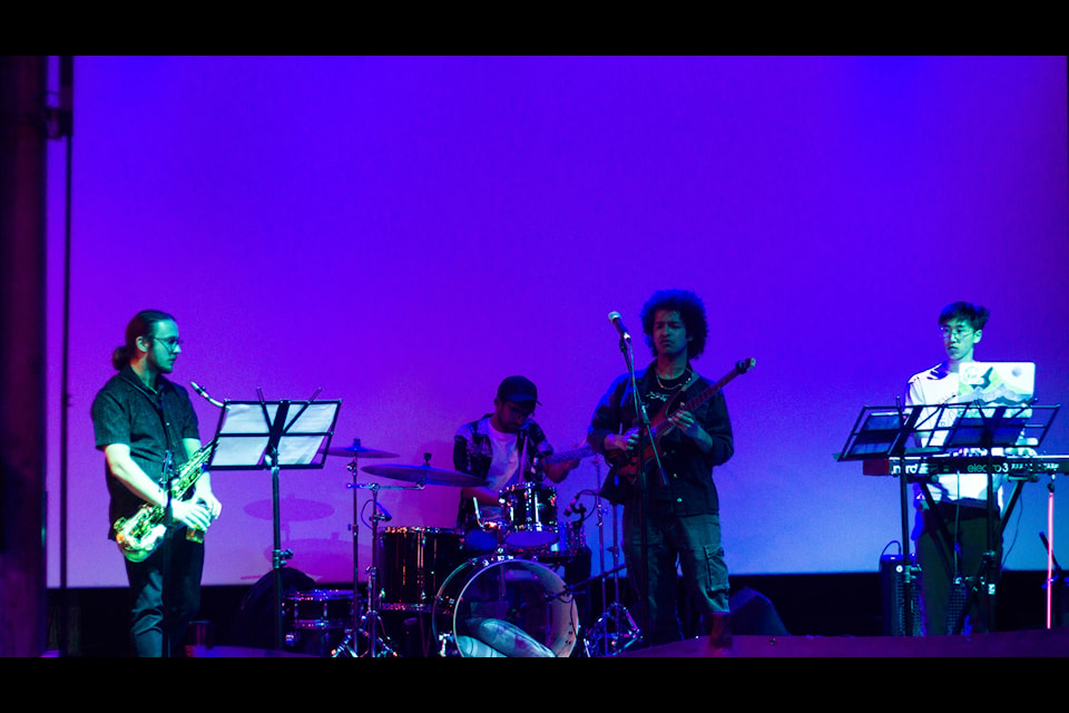 Siddharth Kota (centre) with his team performing at the NXNE.