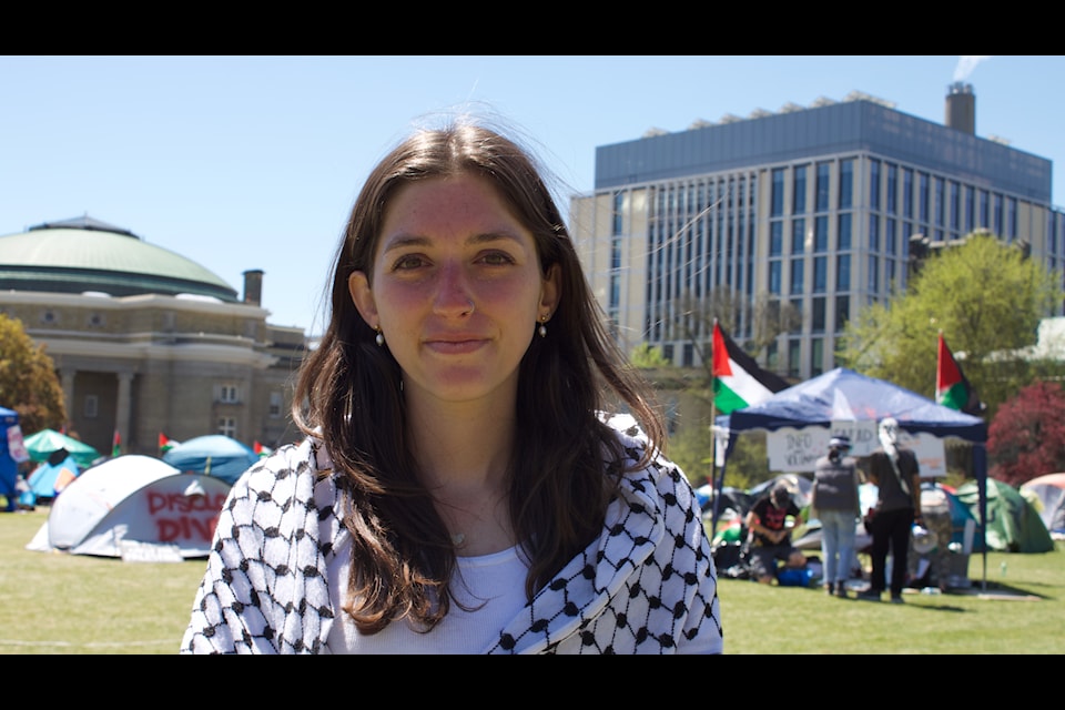 Spokesperson Erin Mackey, speaking on behalf of the protestors, on the sixth day of protests at the University of Toronto St. George Campus, King's Circle.