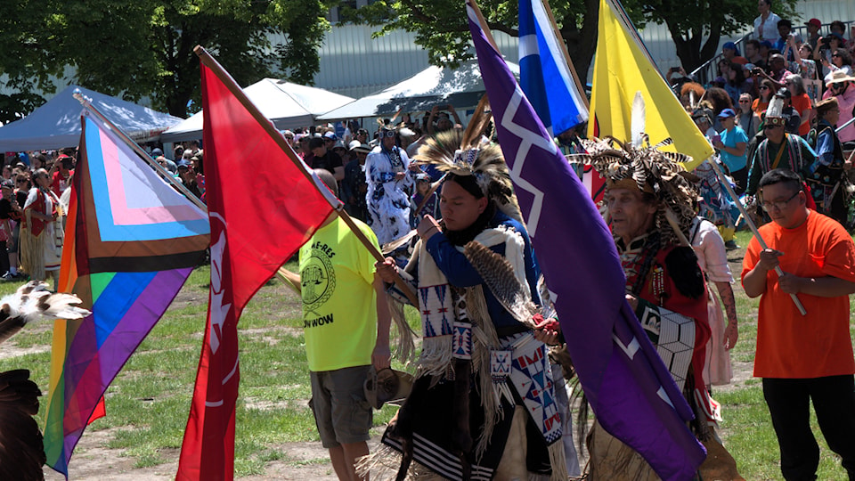 flags-were-marched-around-the-circle-during-the-pow-wows-grand-entry