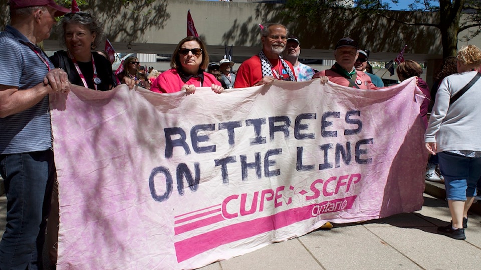 union-members-holding-banner