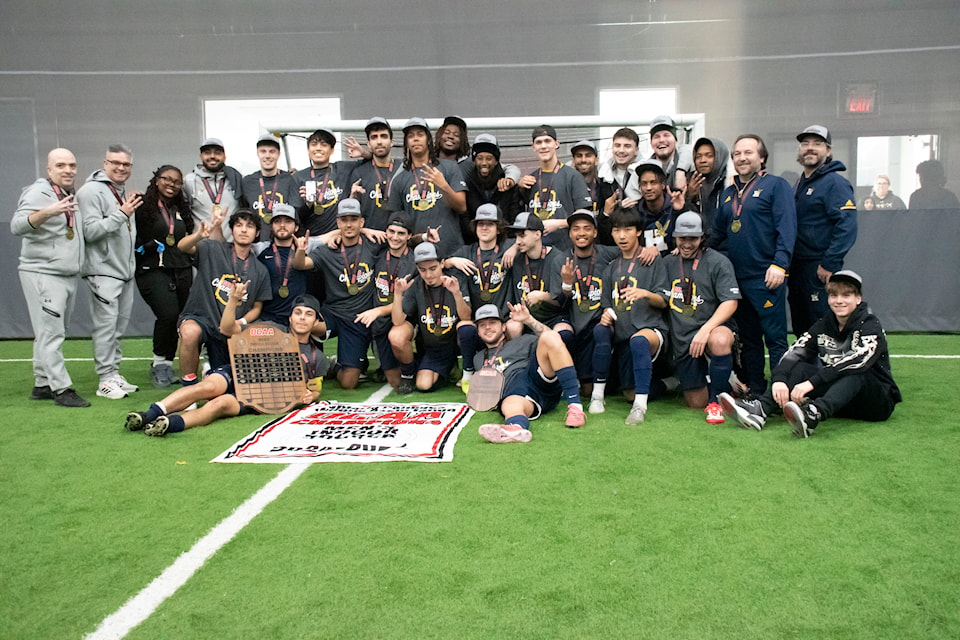 All members of the Humber's men indoor soccer team posing for a team photo after obtaining the gold medal on March 7.