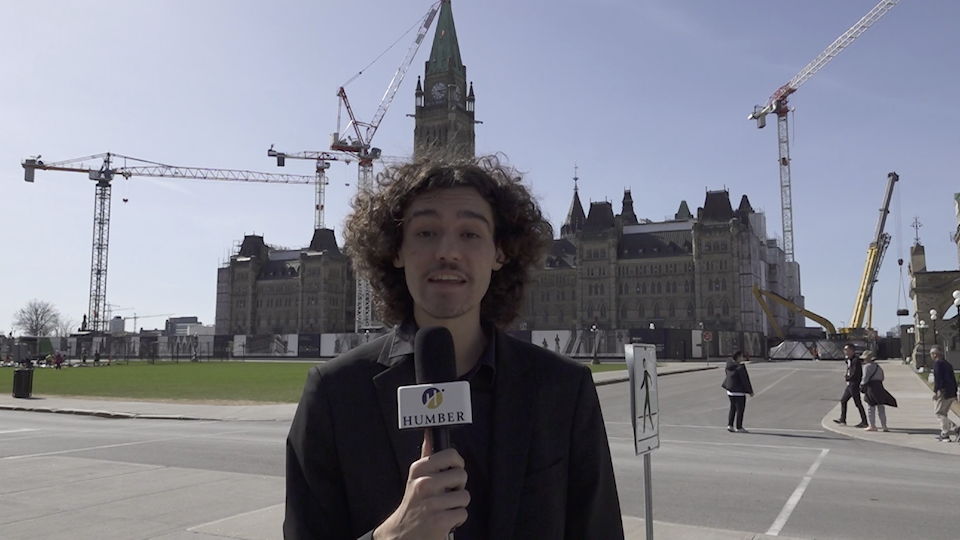 Screen capture of Fernando Bossoes reporting from Ottawa
